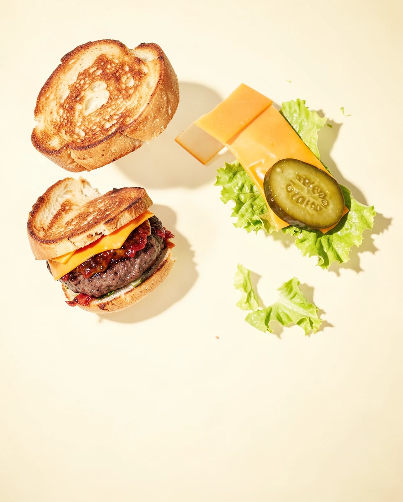 Burger ingredients floating in a playful composition